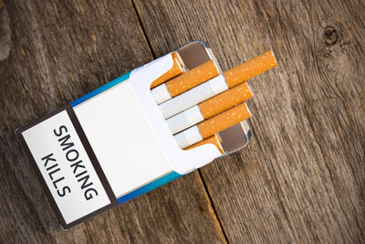 Packet of Cigarettes With Smoking Kills Message on the Box